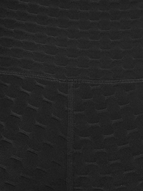 Black plus size high waisted compression capri leggings. Inseam